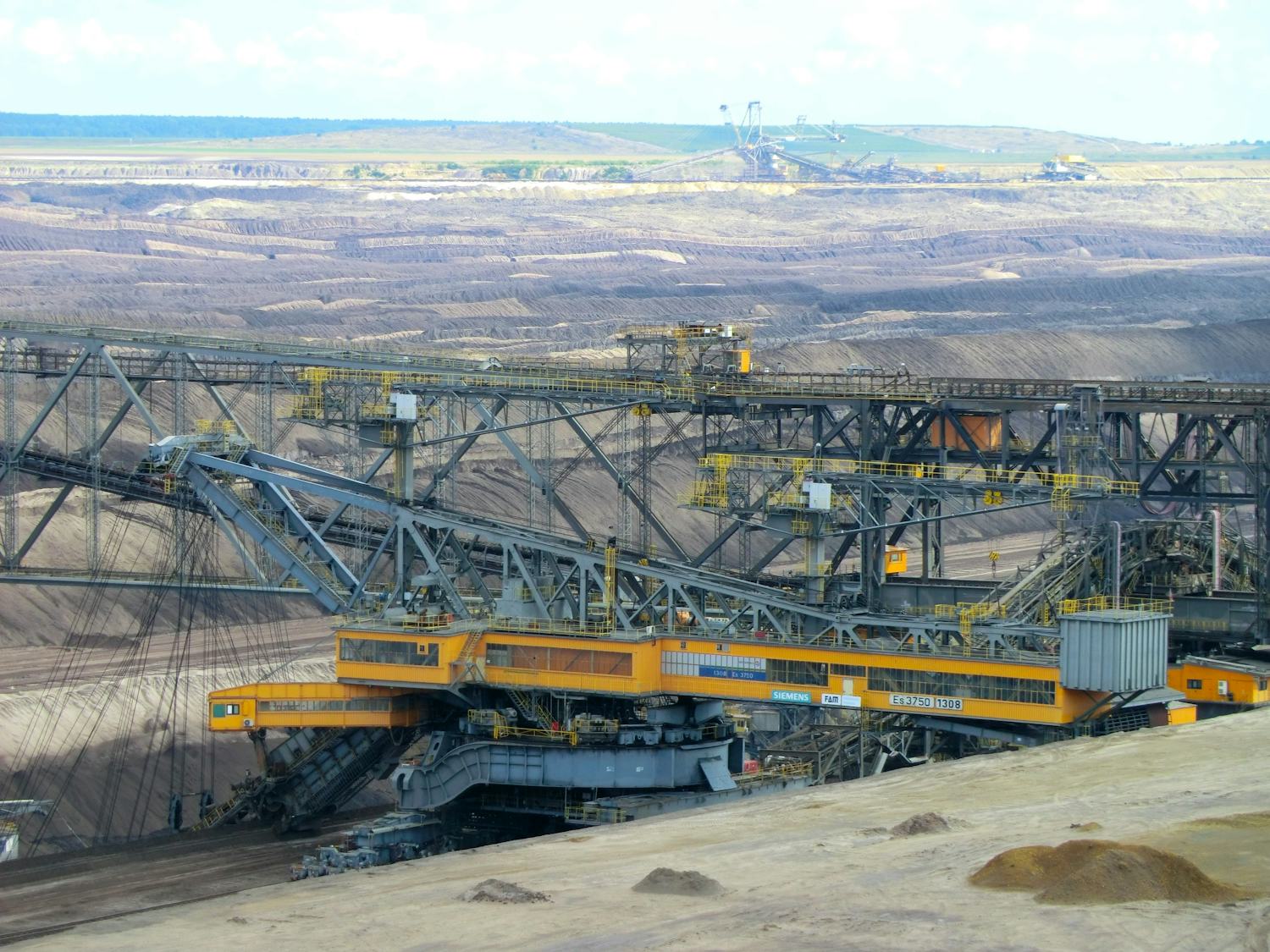 Large mining equipment working an open pit operation